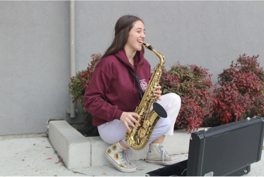 Outstanding student and musicians at Rio Americano, Anna Wilson practices her saxophone. 