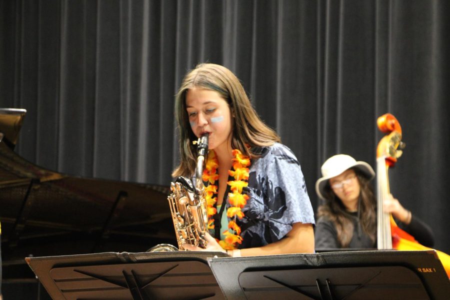 Ana Wilson plays saxophone at the playathon concert.