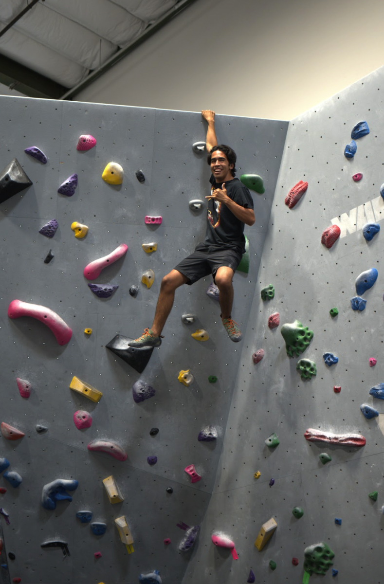 Diego Prieto (12) climbs at Boulder Field.