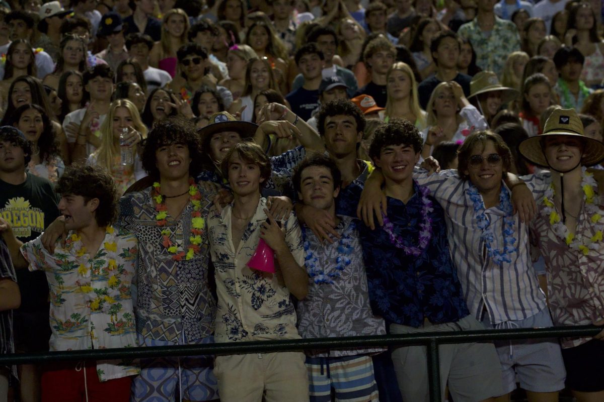 The Rowdy Raiders lined up at a Hawaiian-themed football game.