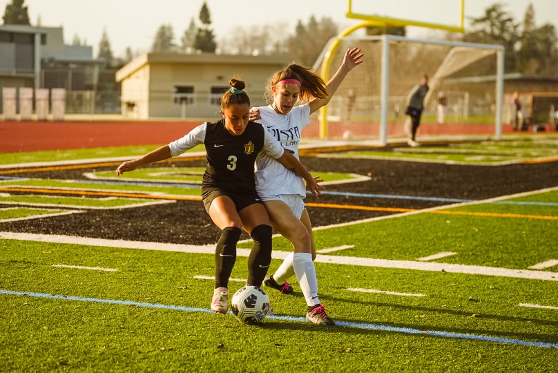 Sophomore Hannah Hopkins defends the ball.