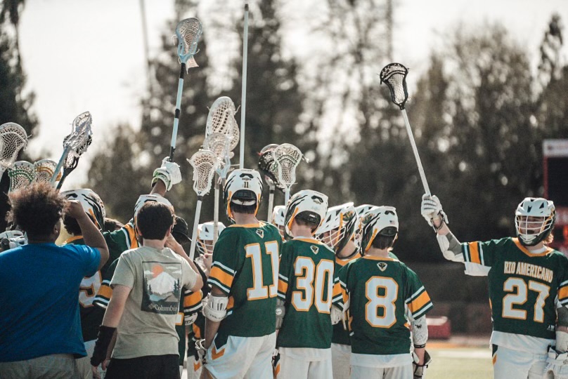 The Raiders battle hard during a varsity boys lacrosse game vs. Jesuit on March 20.