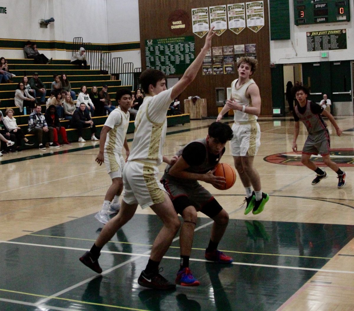 Jared Mikacich (11) defents against Pleasant Grove in a preseason game in November, 2024.