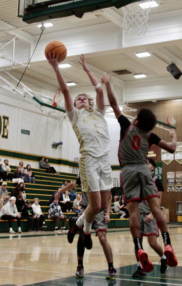 Ian Engh shoots against Pleasant Grove in a preseason game in November 2024.