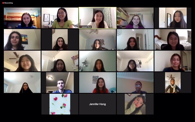 Student tutors meet over Zoom once a month to discuss progress with helping younger students.