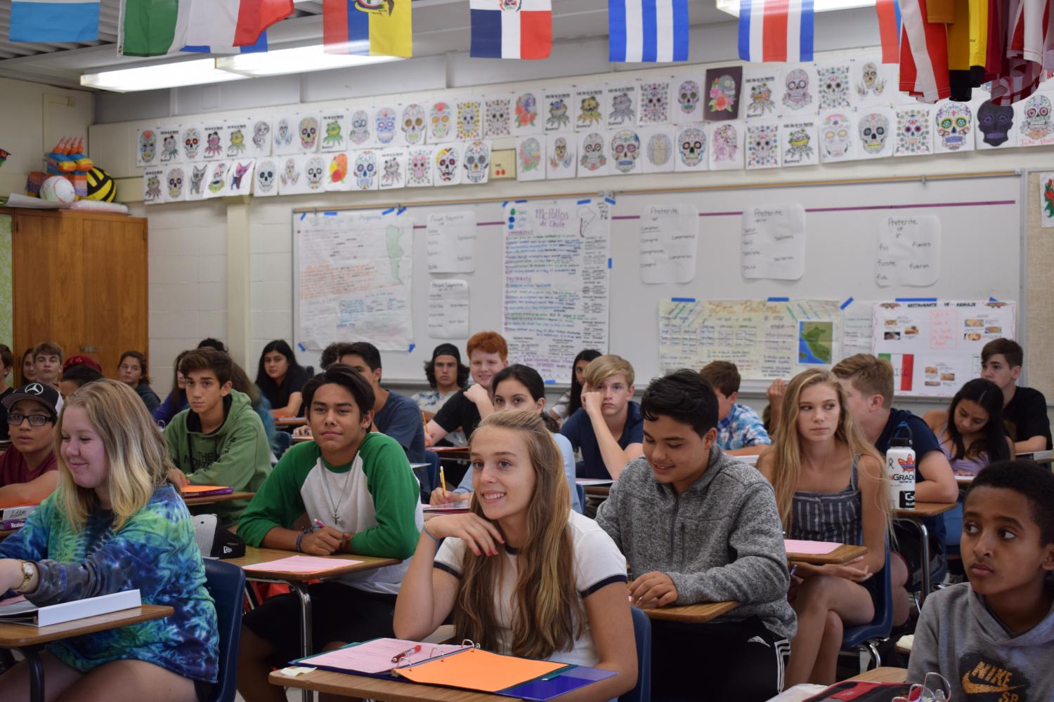 Students struggle to find seating in Brian Asher's Spanish class.