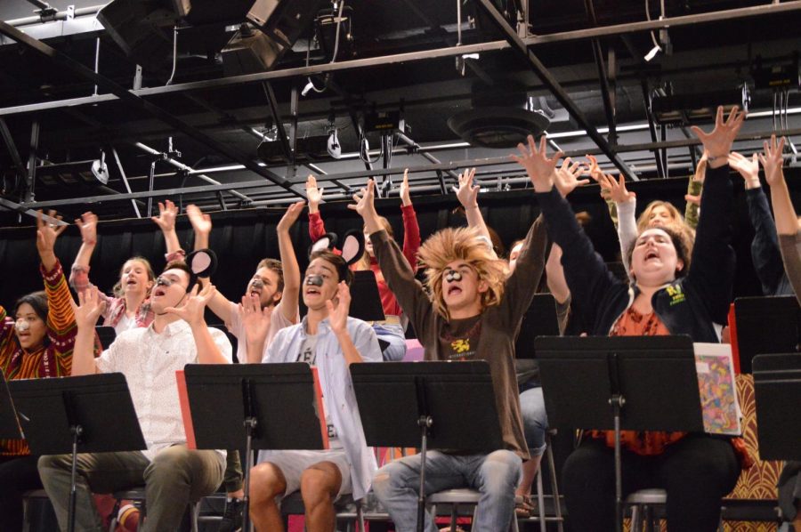 (From left) Josh Davis, Kanai Kalama, Owen Bister, and Sadie Odell perform a parody of Imagine Dragon’s “Believer” during rehearsals.