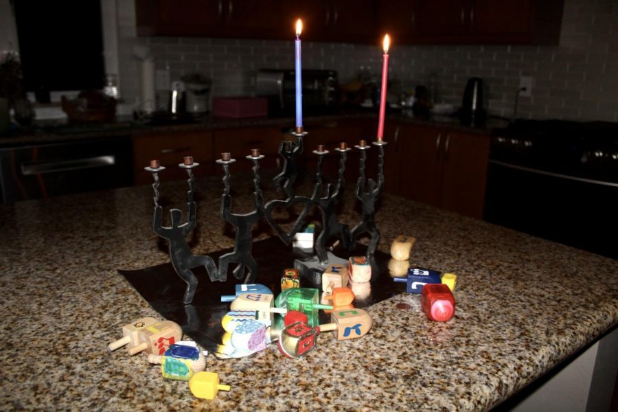 Rather than large family gatherings, many Hanukkah celebrations this year  consist only of members of the same household. However, many customs persist, such as the lighting of the menorah and the playing of dreidel games. 