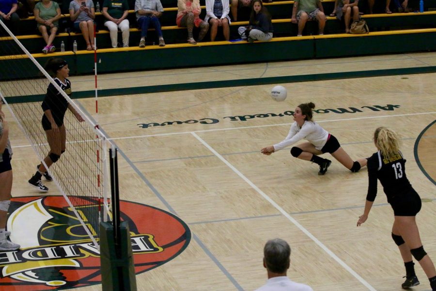 Senior Chyna Wright digs the ball during a 3-1 win over Vista del Lago, Oct. 26.