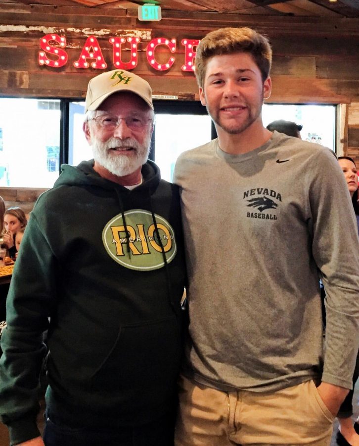 Senior Logan Wheeler stands with grandpa Steve Silveira.