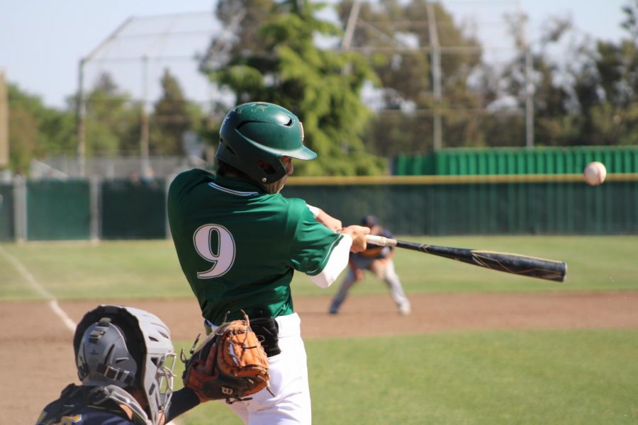 Elijah Rogalski his a home run against Inderkum. Rio won 10-3. Photo by Josh Zezzo