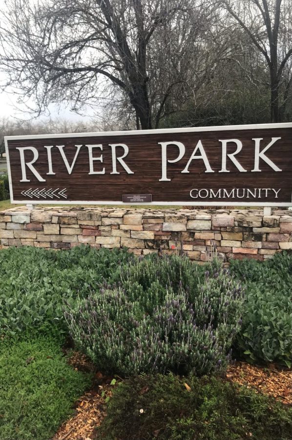 The entrance to River Park welcomes residents and visitors with a plethora of greenery and this sign across the street from Fremont Presbyterian Church. 