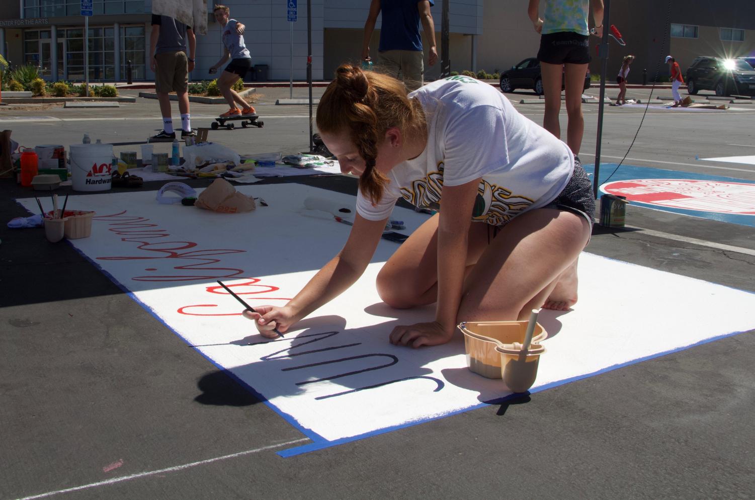 Seniors Paint Parking Spots