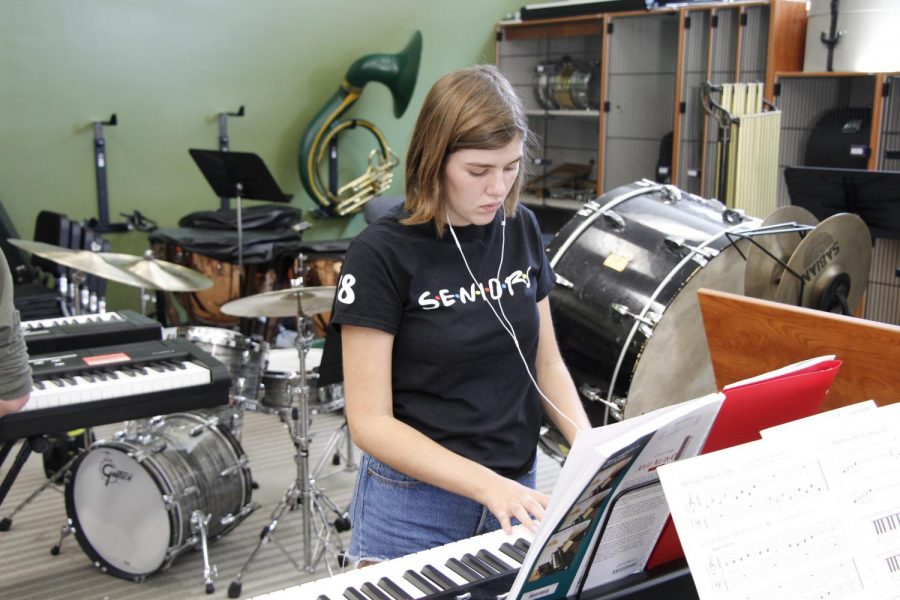 Senior Elizabeth Finnecy working on her piano piece in the new theater’s beginning piano class.