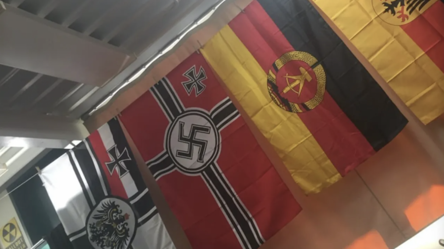 A student photographed the Nazi flag amid other historical German flags.