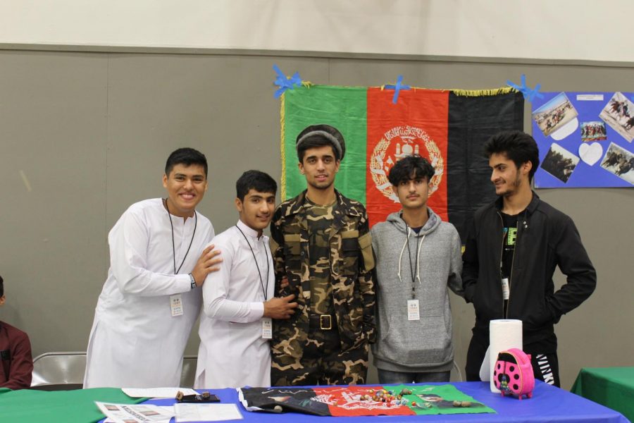 Hedayat Ebrahim Khel and friends teach other students about their culture at the Global Expo on campus last fall.