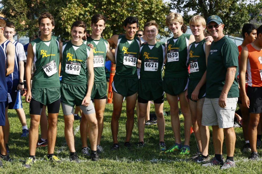 Former coach Gordon Hubble with varsity runners Nicolas Gorman, Ross Gowan, Jack Pallasen, Chase Gordon, Jensen Salvatori, Reed Moore, and Jack Murphy