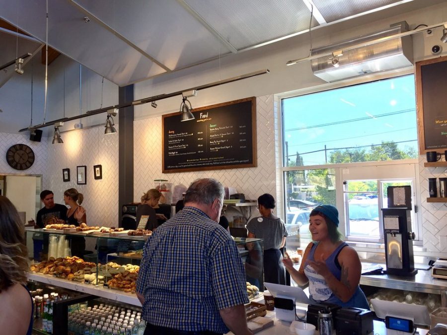 Philz employees cheerfully take food and drink orders and brew fresh batches of coffee.